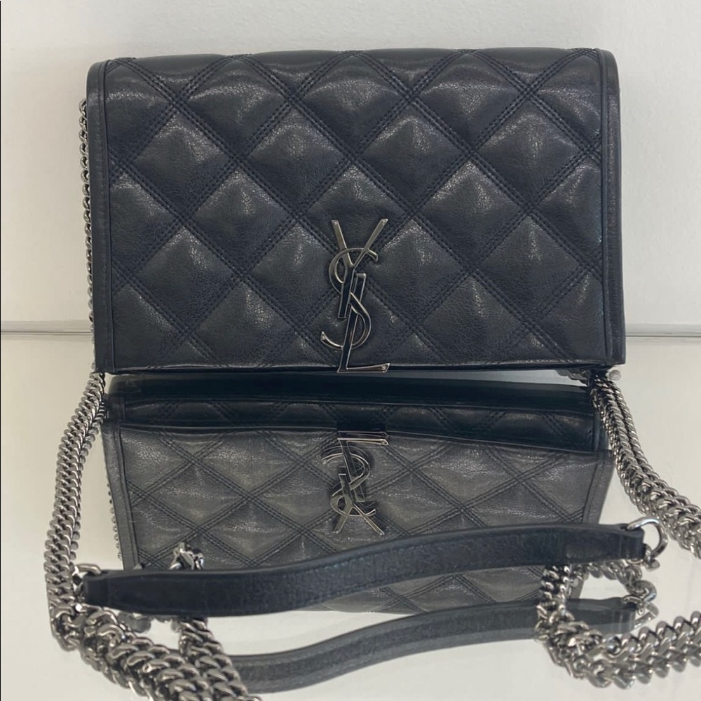 Authentic YSL Black/Gunmetal crossbody bag. Never worn, but no tags.